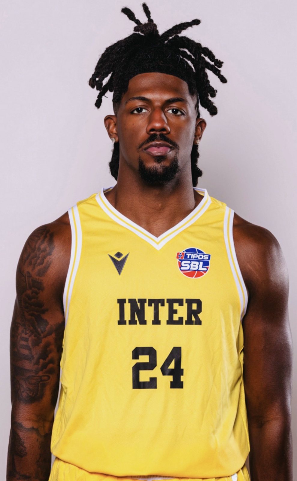 Nehemiah Benson portrait in official Inter Bratislava yellow uniform